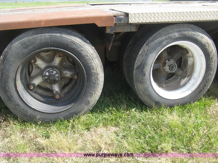 image for item L6411 1989 Fontaine DFT4-7048 drop deck trailer