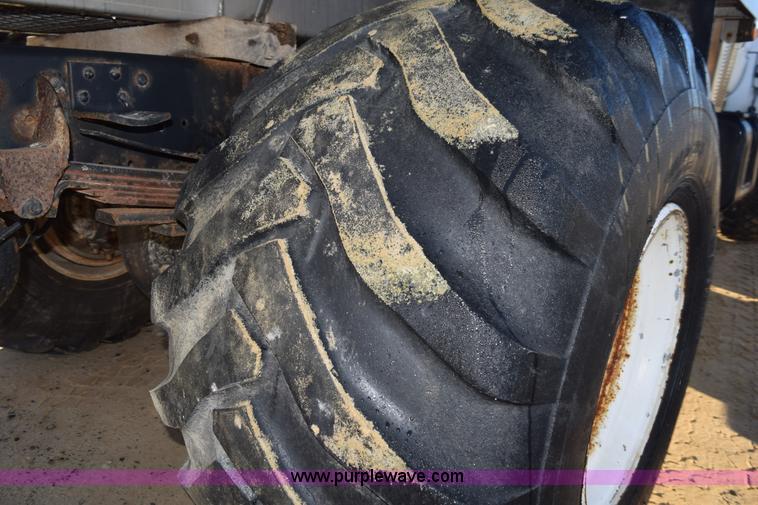 image for item J8483 1999 Chevrolet C7500 applicator truck