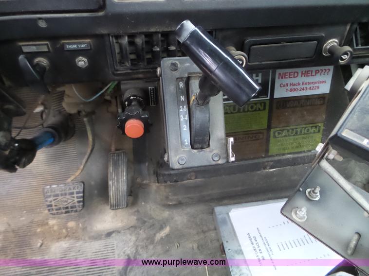 image for item L5023 1996 International 2554 Silver Wheels self-propelled sprayer