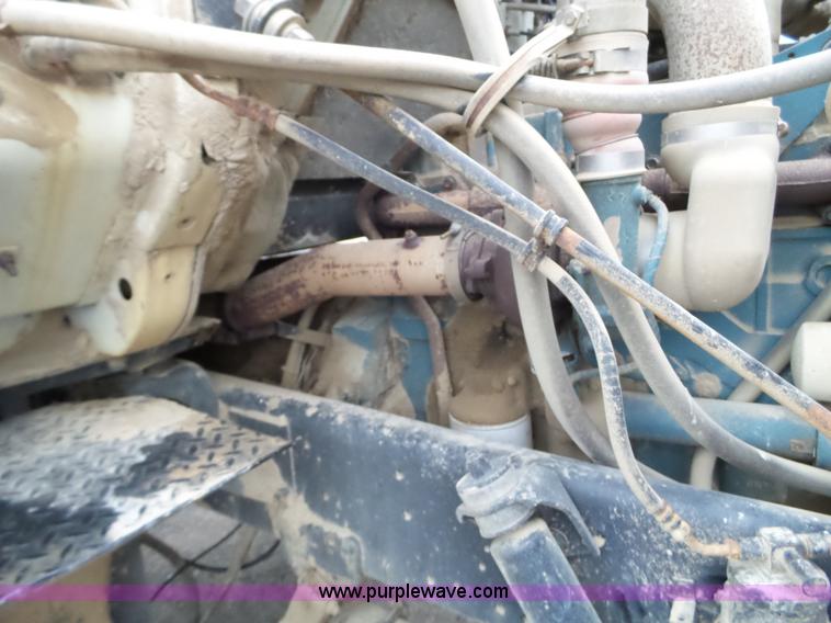 image for item L5023 1996 International 2554 Silver Wheels self-propelled sprayer