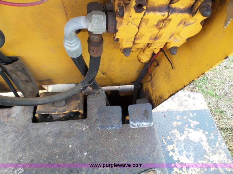 image for item L5036 1994 NMC Swinger 240 wheel loader