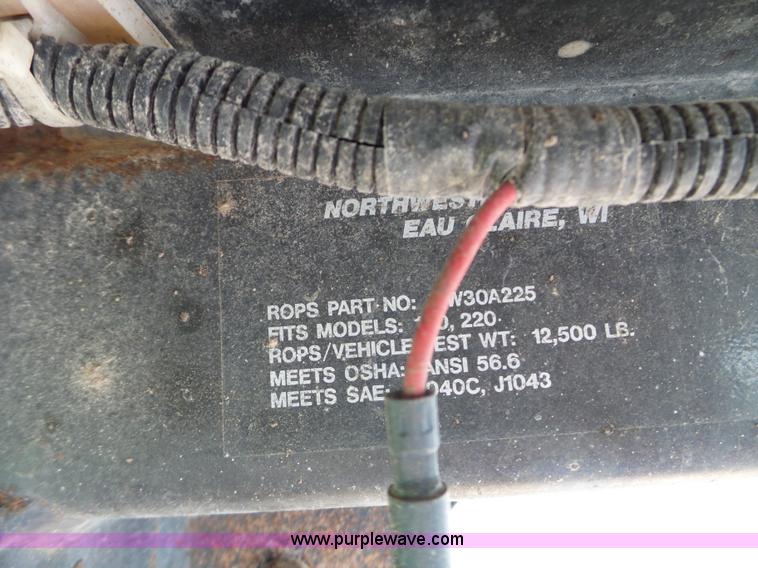 image for item L5036 1994 NMC Swinger 240 wheel loader