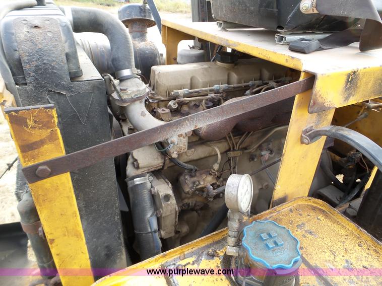 image for item L5036 1994 NMC Swinger 240 wheel loader