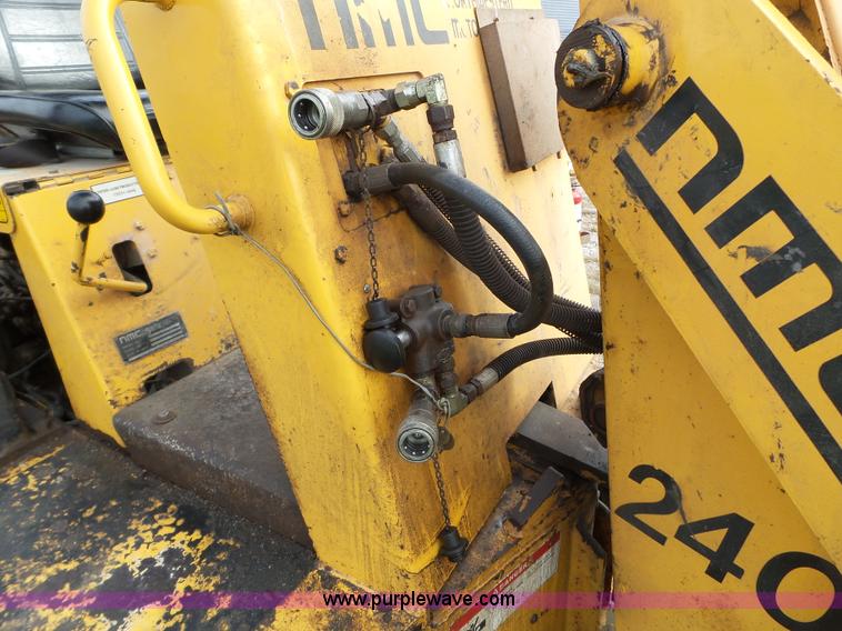 image for item L5036 1994 NMC Swinger 240 wheel loader