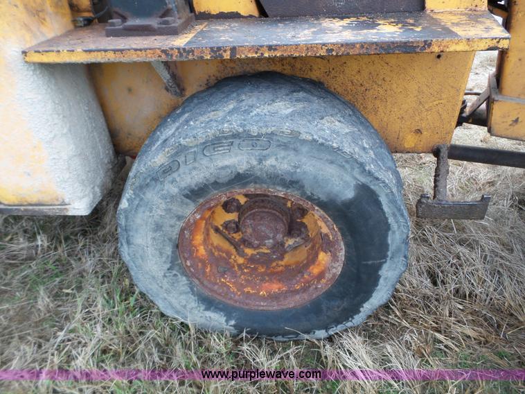 image for item L5036 1994 NMC Swinger 240 wheel loader
