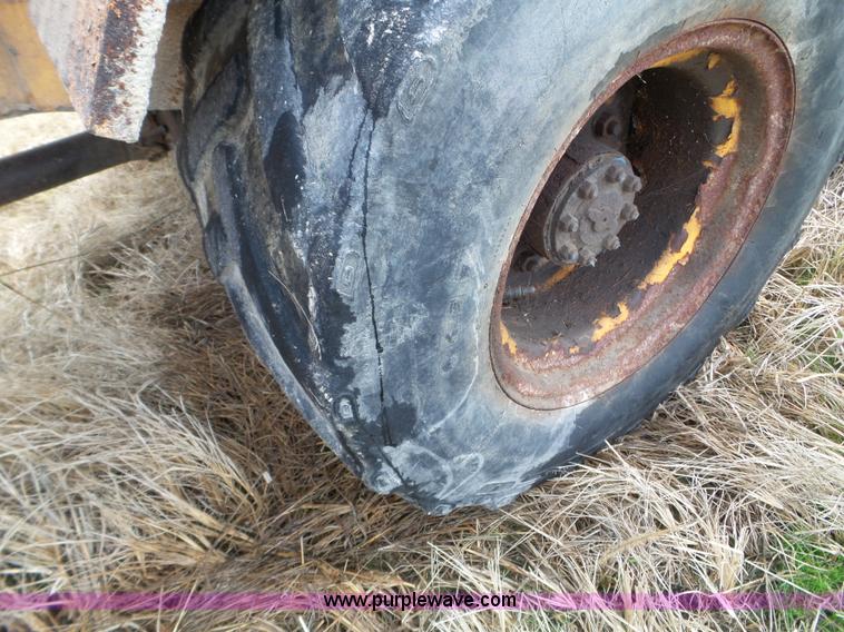 image for item L5036 1994 NMC Swinger 240 wheel loader