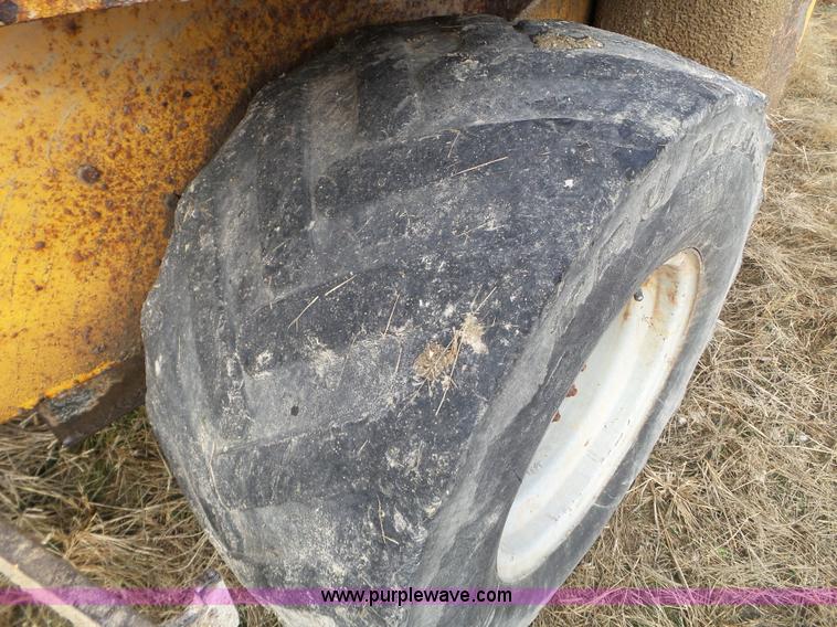 image for item L5036 1994 NMC Swinger 240 wheel loader