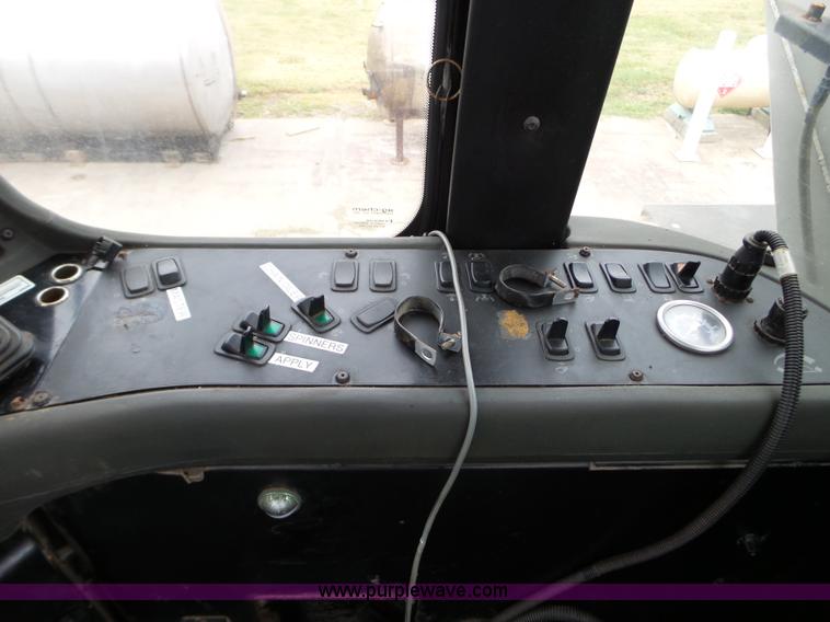 image for item L5061 2005 Ag-Chem TerraGator 8103 applicator cab and chassis