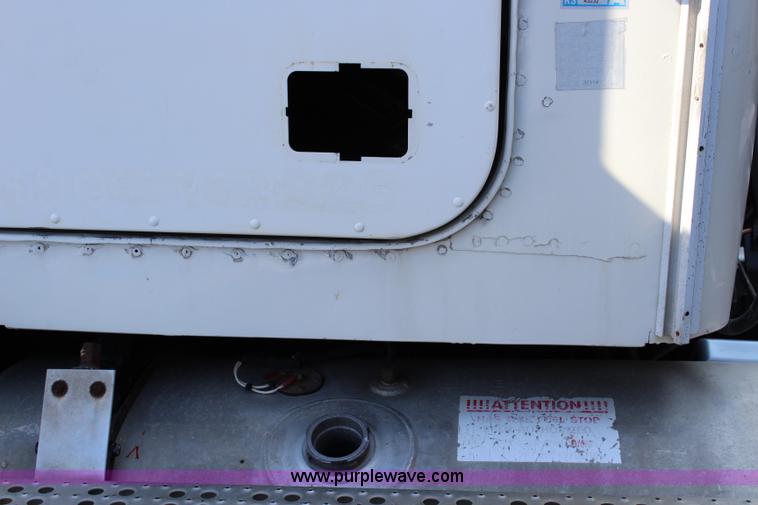 image for item L2469 2002 Freightliner FLD120 semi truck