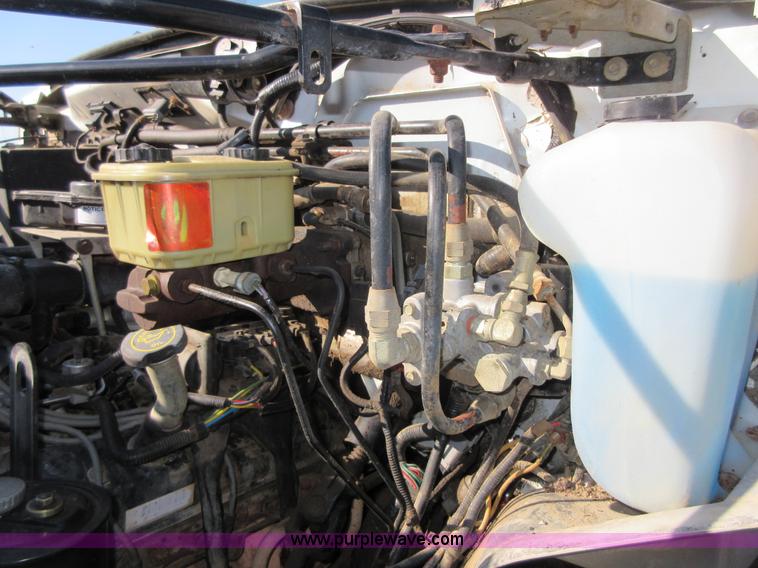 image for item I1903 1997 Ford F700 feed truck