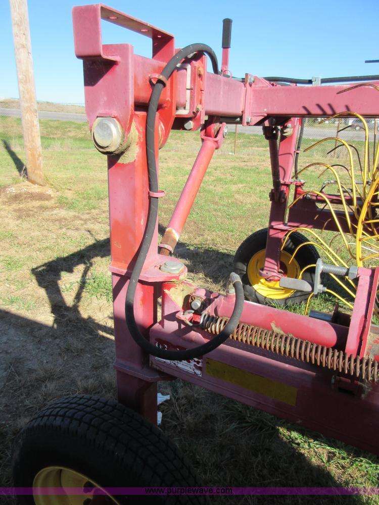 image for item I1917 New Holland HT154 hay rake