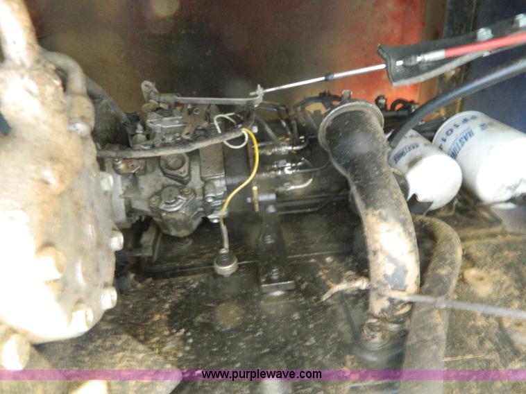 image for item K8206 2006 New Holland BR780A round baler