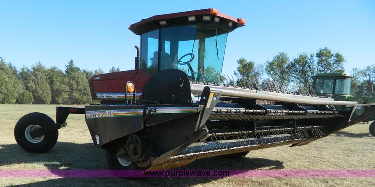 image for item K8208 1997 MacDon 9300 self-propelled windrower