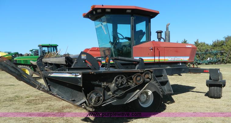 image for item K8208 1997 MacDon 9300 self-propelled windrower