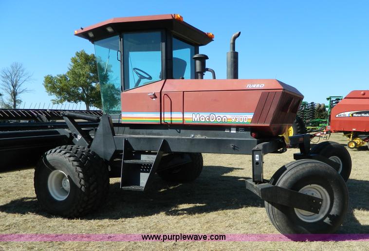 image for item K8208 1997 MacDon 9300 self-propelled windrower