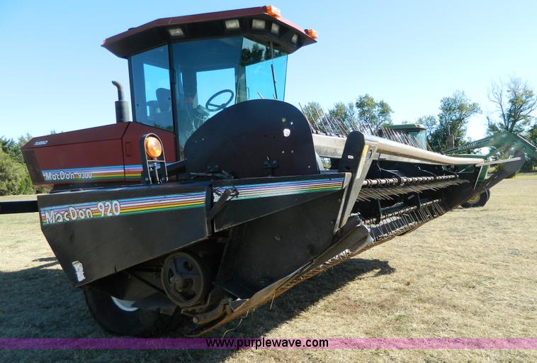 image for item K8208 1997 MacDon 9300 self-propelled windrower