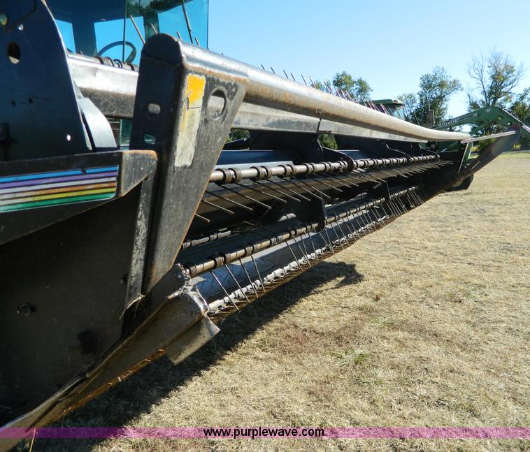 image for item K8208 1997 MacDon 9300 self-propelled windrower