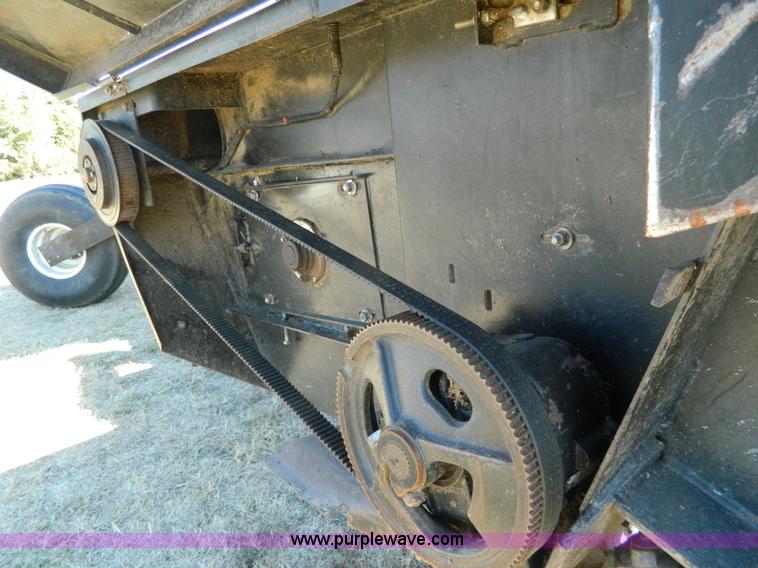 image for item K8208 1997 MacDon 9300 self-propelled windrower