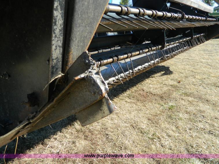 image for item K8208 1997 MacDon 9300 self-propelled windrower