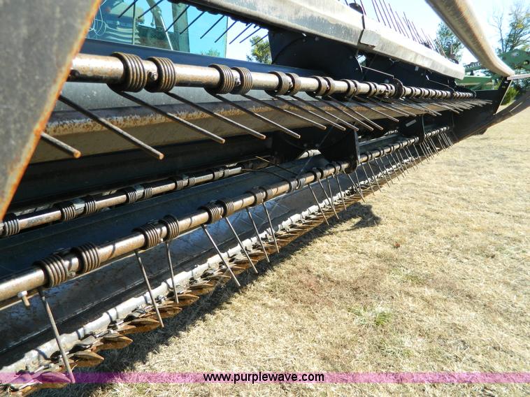 image for item K8208 1997 MacDon 9300 self-propelled windrower