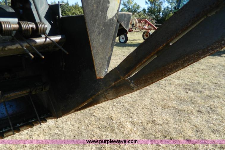 image for item K8208 1997 MacDon 9300 self-propelled windrower