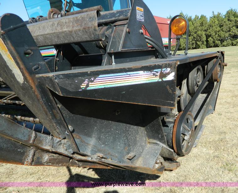 image for item K8208 1997 MacDon 9300 self-propelled windrower