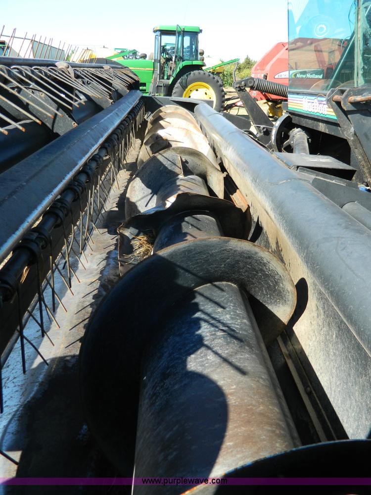 image for item K8208 1997 MacDon 9300 self-propelled windrower