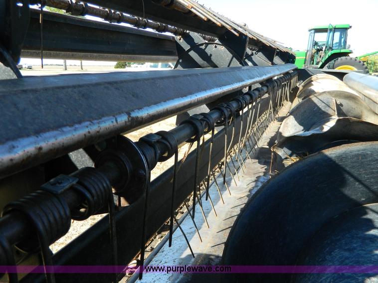 image for item K8208 1997 MacDon 9300 self-propelled windrower