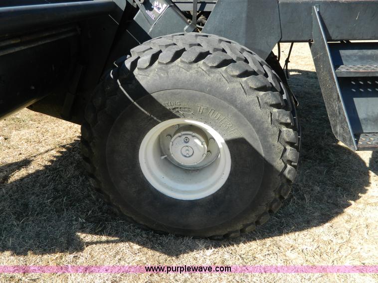 image for item K8208 1997 MacDon 9300 self-propelled windrower