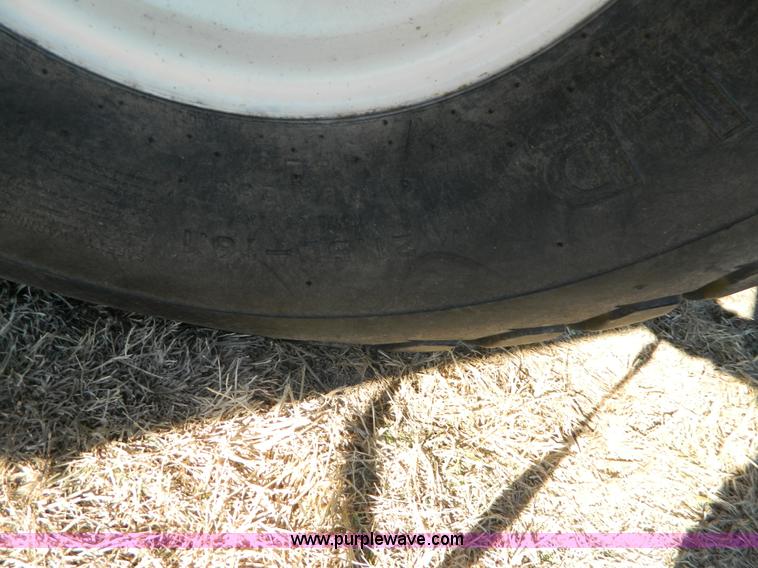 image for item K8208 1997 MacDon 9300 self-propelled windrower