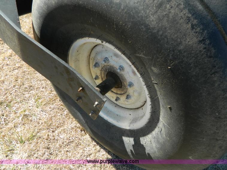 image for item K8208 1997 MacDon 9300 self-propelled windrower