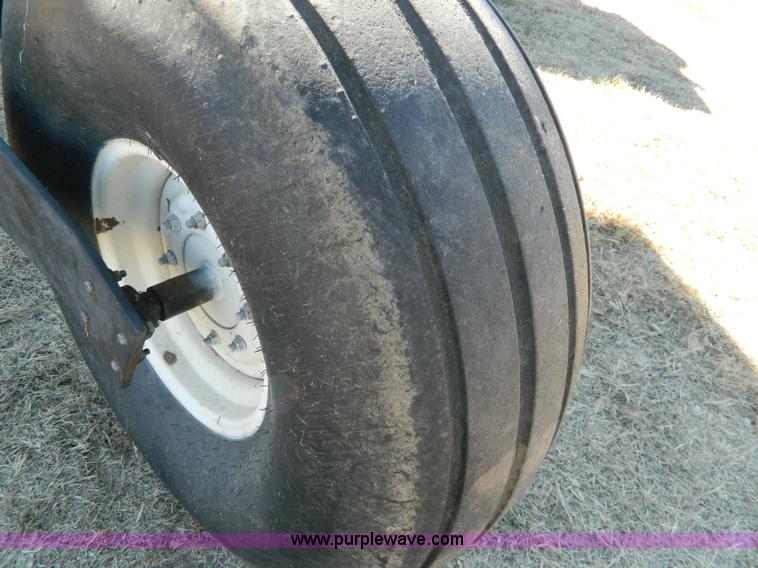 image for item K8208 1997 MacDon 9300 self-propelled windrower