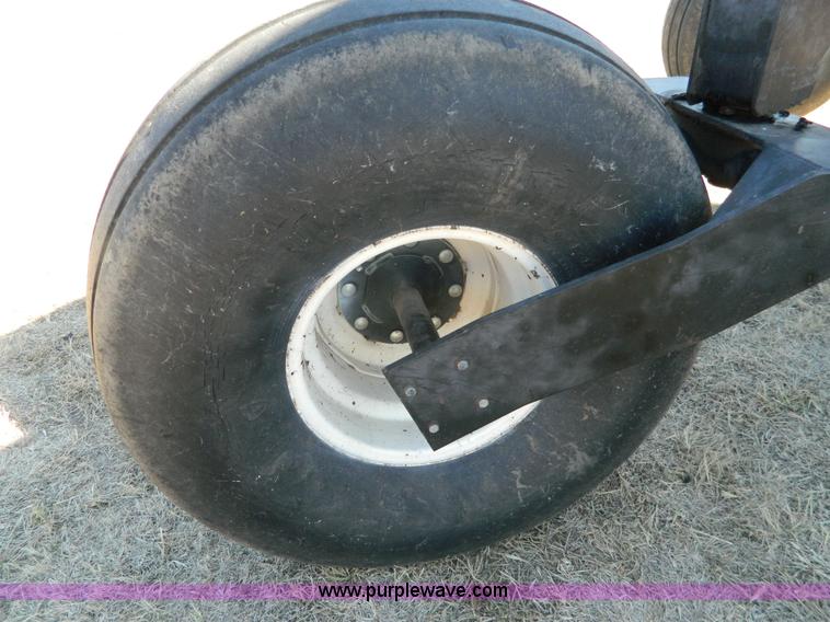 image for item K8208 1997 MacDon 9300 self-propelled windrower