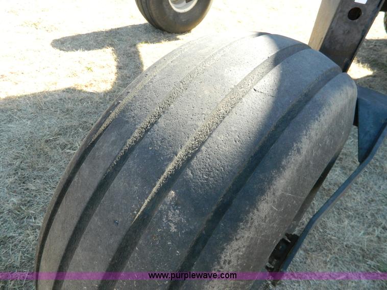 image for item K8208 1997 MacDon 9300 self-propelled windrower