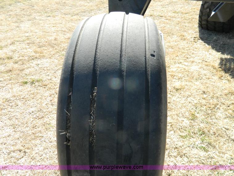 image for item K8208 1997 MacDon 9300 self-propelled windrower