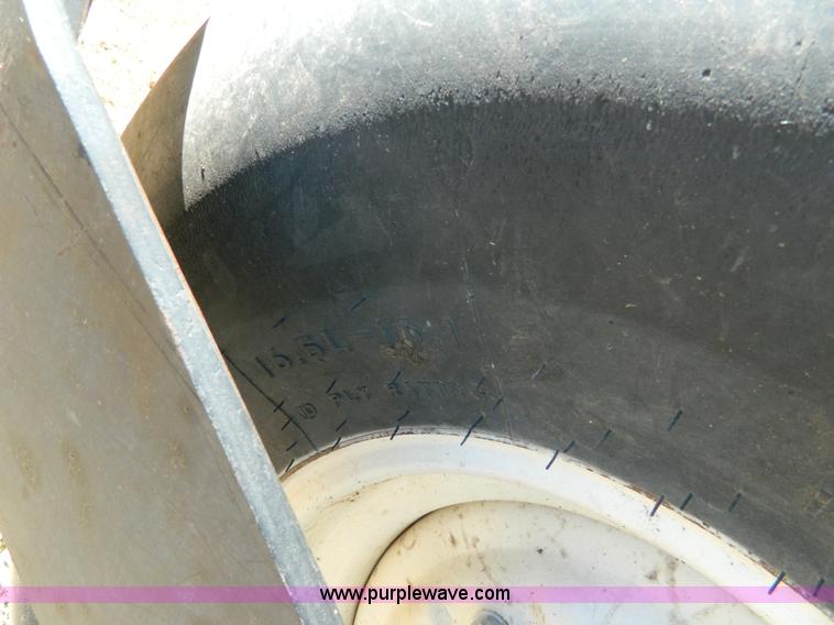 image for item K8208 1997 MacDon 9300 self-propelled windrower