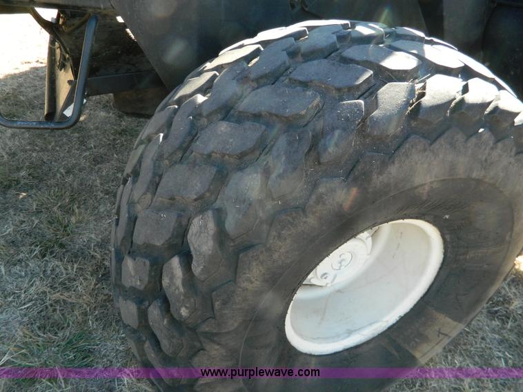 image for item K8208 1997 MacDon 9300 self-propelled windrower