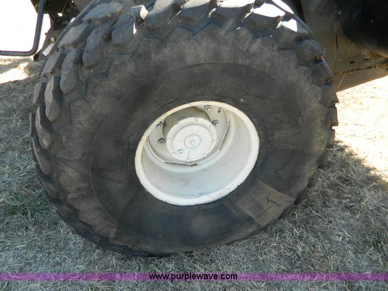 image for item K8208 1997 MacDon 9300 self-propelled windrower