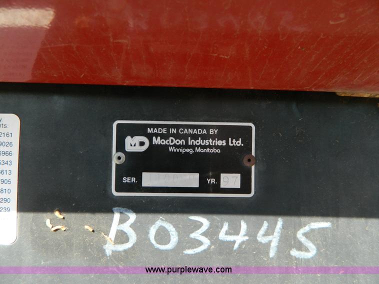 image for item K8208 1997 MacDon 9300 self-propelled windrower