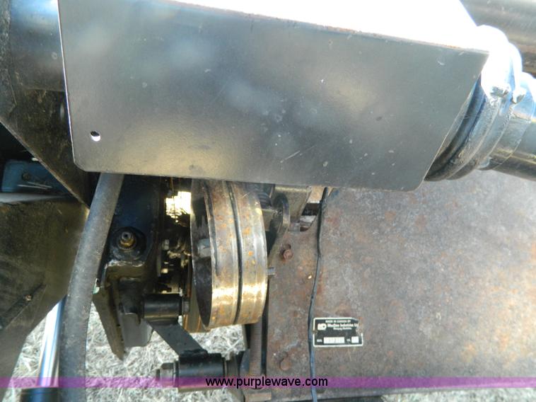 image for item K8208 1997 MacDon 9300 self-propelled windrower