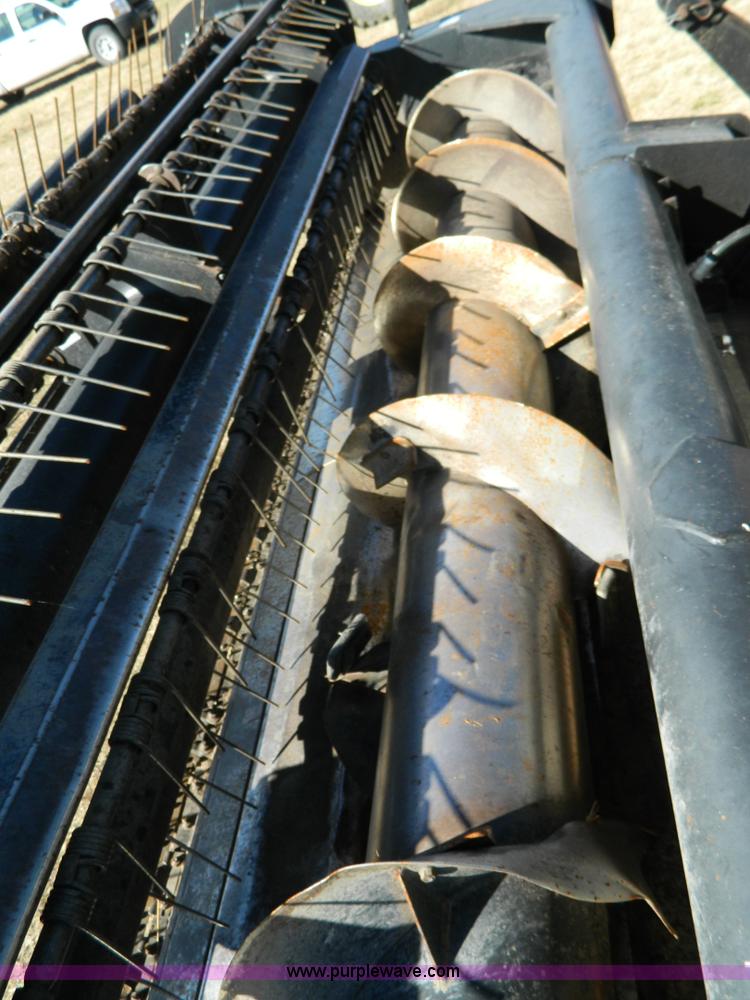 image for item K8208 1997 MacDon 9300 self-propelled windrower