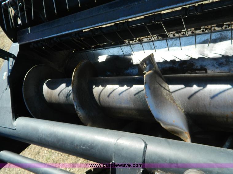 image for item K8208 1997 MacDon 9300 self-propelled windrower