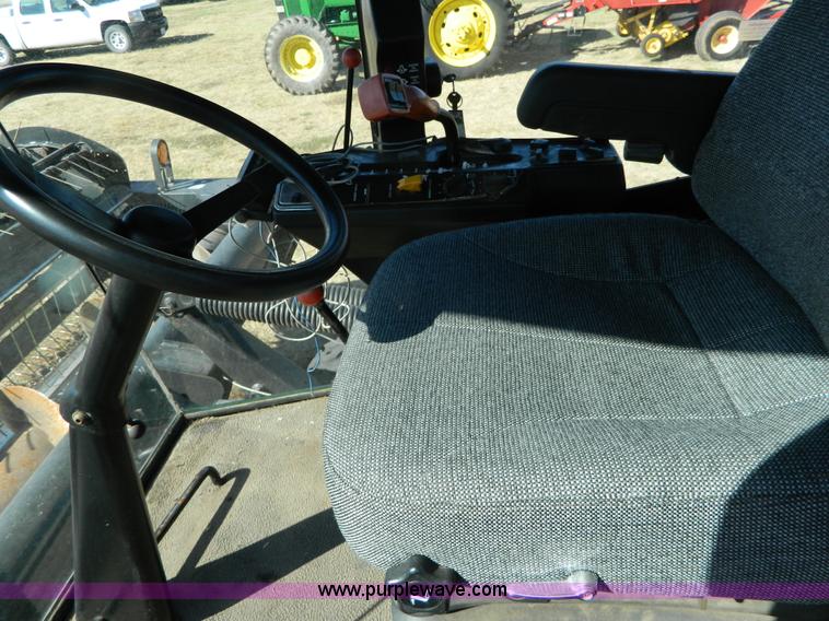 image for item K8208 1997 MacDon 9300 self-propelled windrower