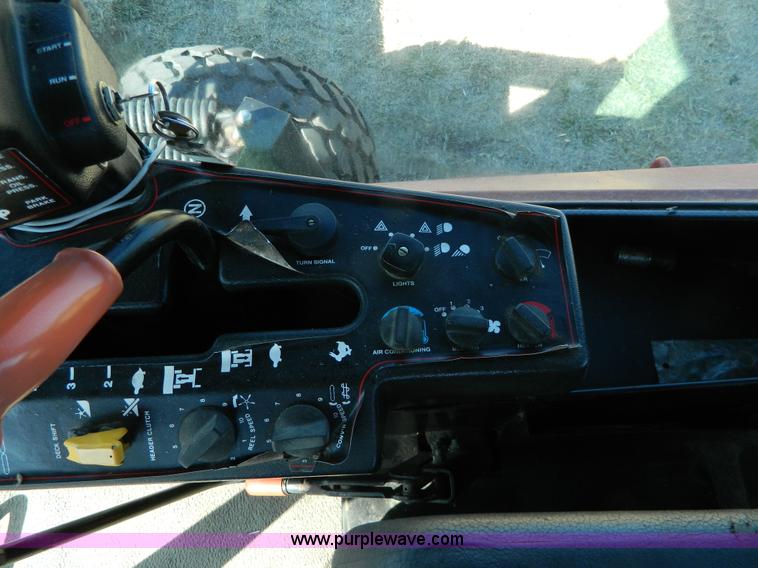 image for item K8208 1997 MacDon 9300 self-propelled windrower