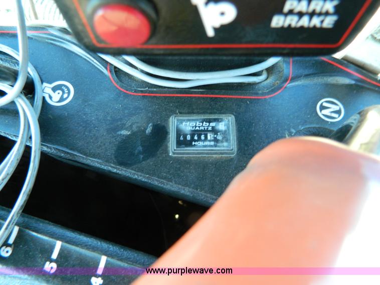 image for item K8208 1997 MacDon 9300 self-propelled windrower