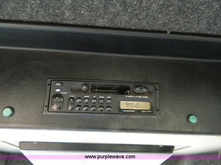 image for item K8208 1997 MacDon 9300 self-propelled windrower