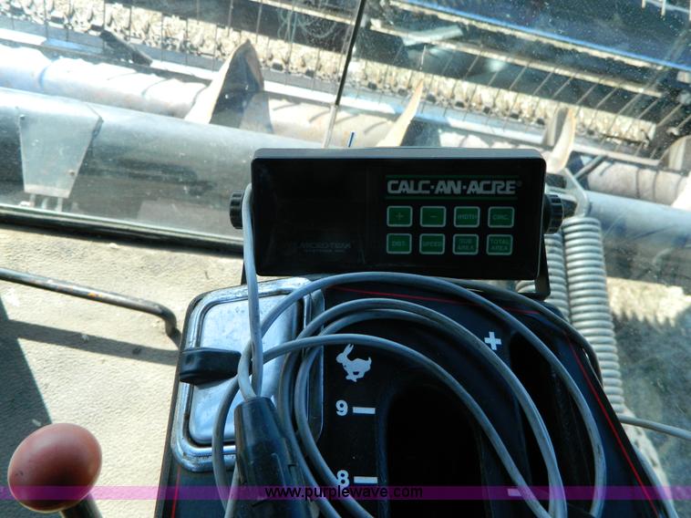 image for item K8208 1997 MacDon 9300 self-propelled windrower