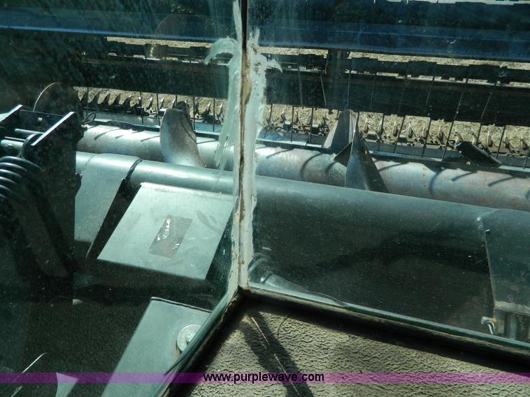 image for item K8208 1997 MacDon 9300 self-propelled windrower