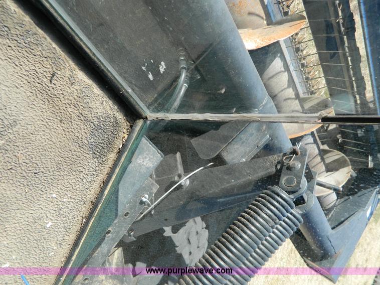 image for item K8208 1997 MacDon 9300 self-propelled windrower