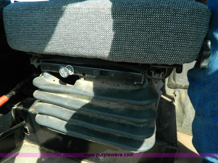 image for item K8208 1997 MacDon 9300 self-propelled windrower